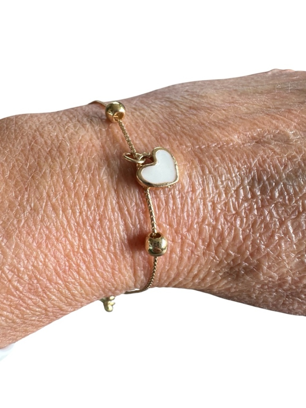 Gold Adjustable Length Bracelet with White Heart and Gold Bead Accents